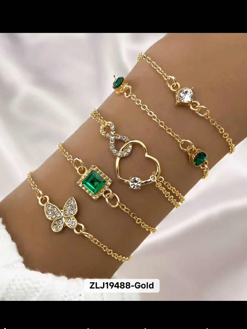 Gold Bracelet Set with Emerald and Crystal Accents -